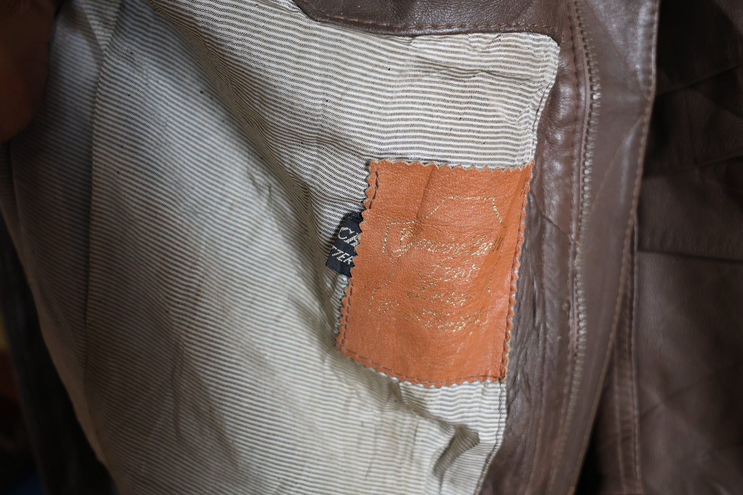 Brown sleeveless leather jacket