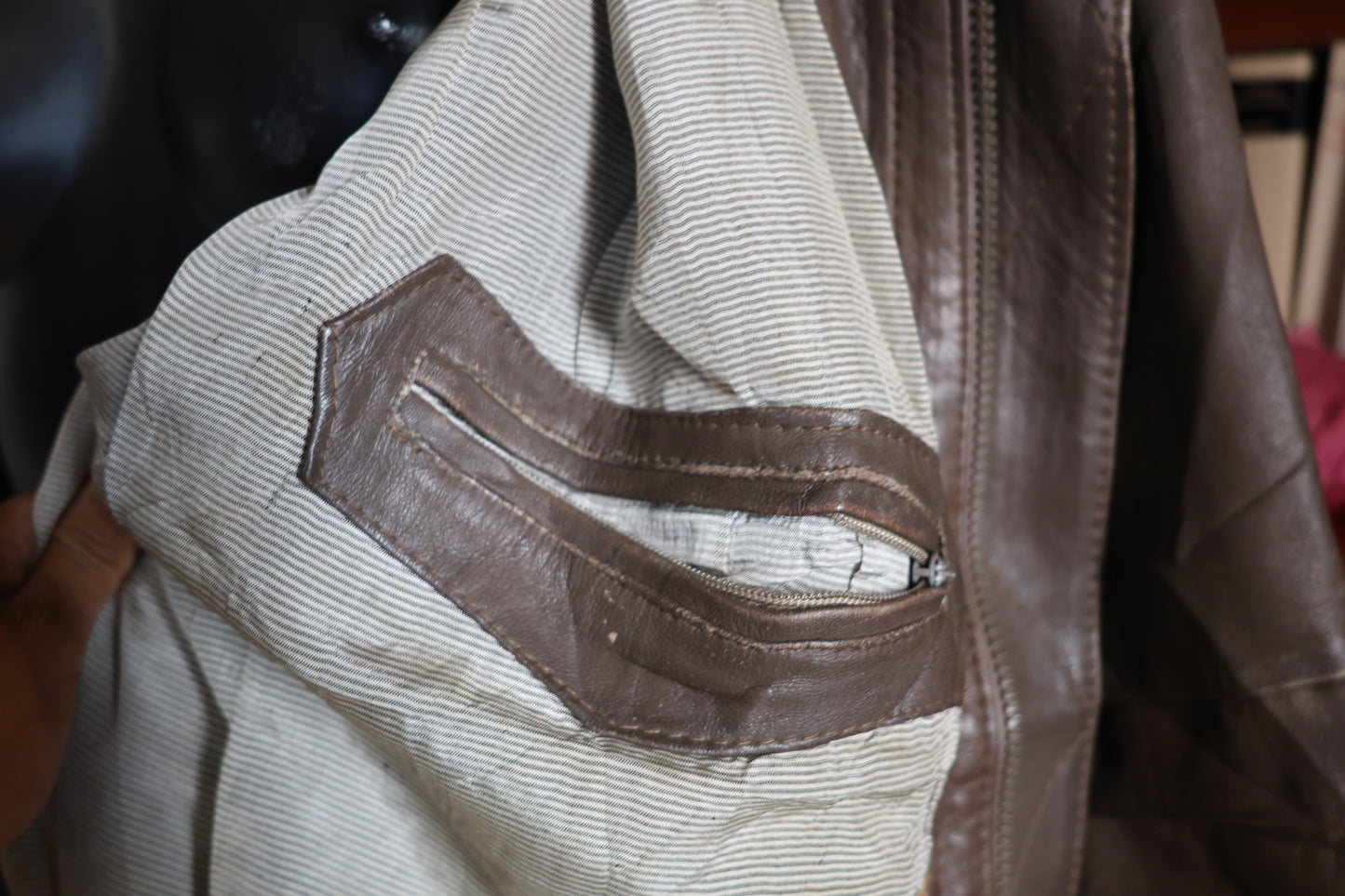 Brown sleeveless leather jacket