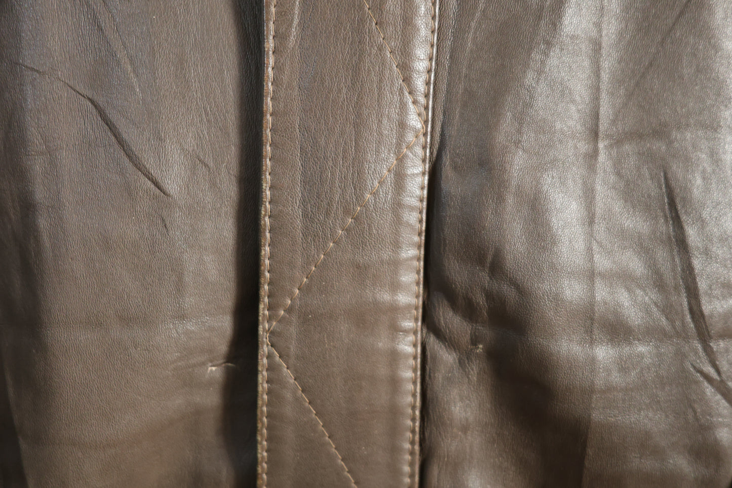 Brown sleeveless leather jacket
