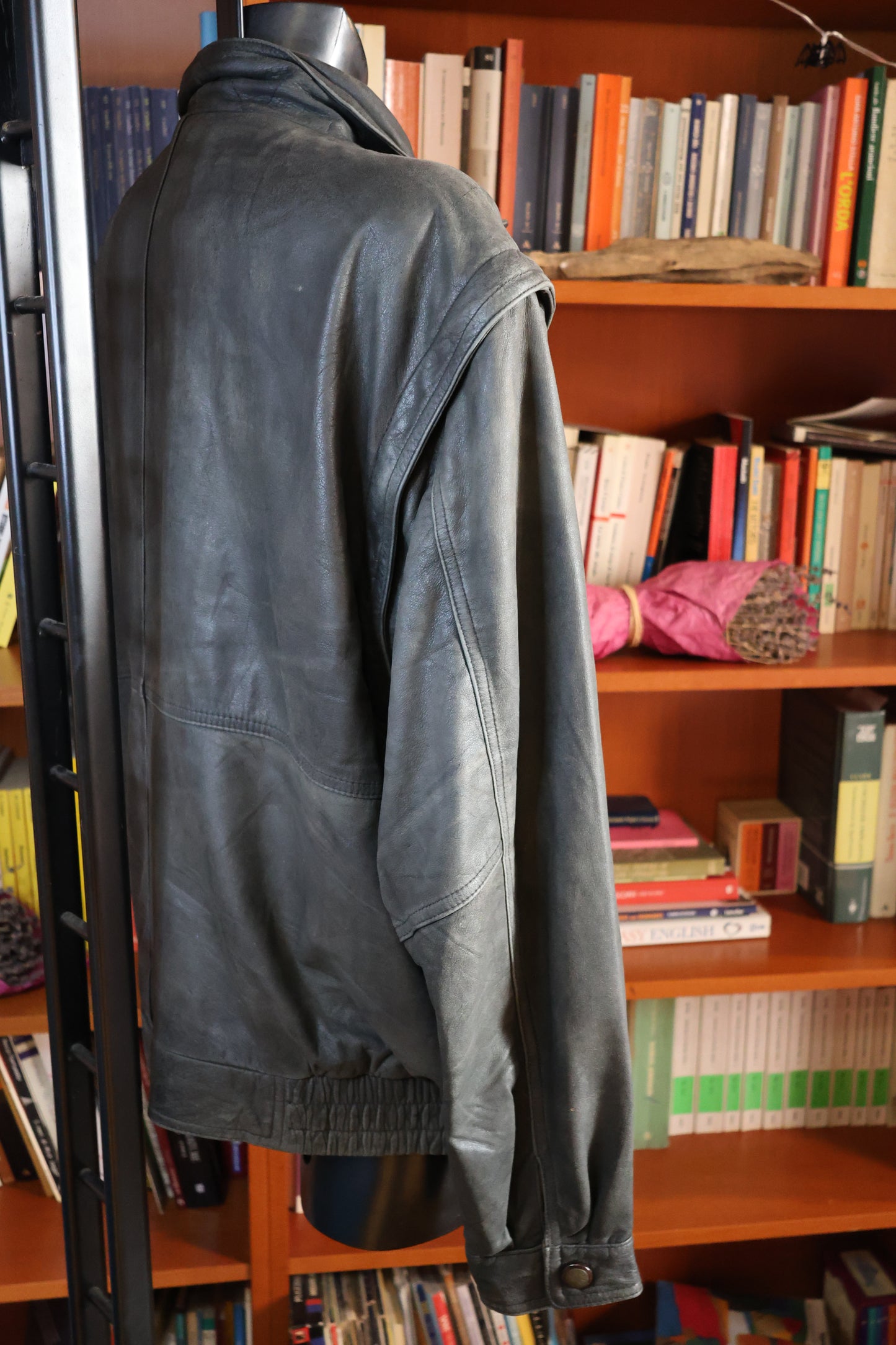 Washed out black leather bomber jacket