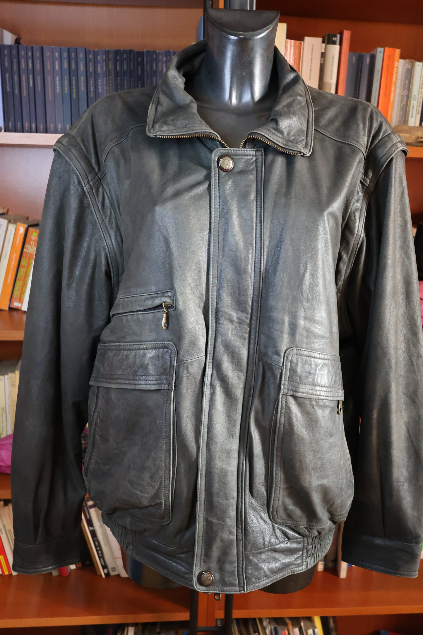 Washed out black leather bomber jacket