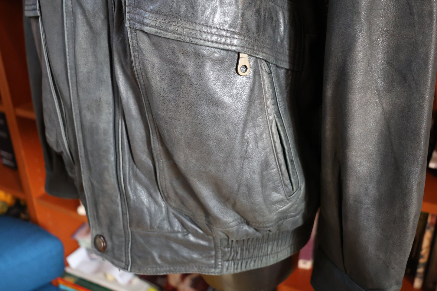 Washed out black leather bomber jacket