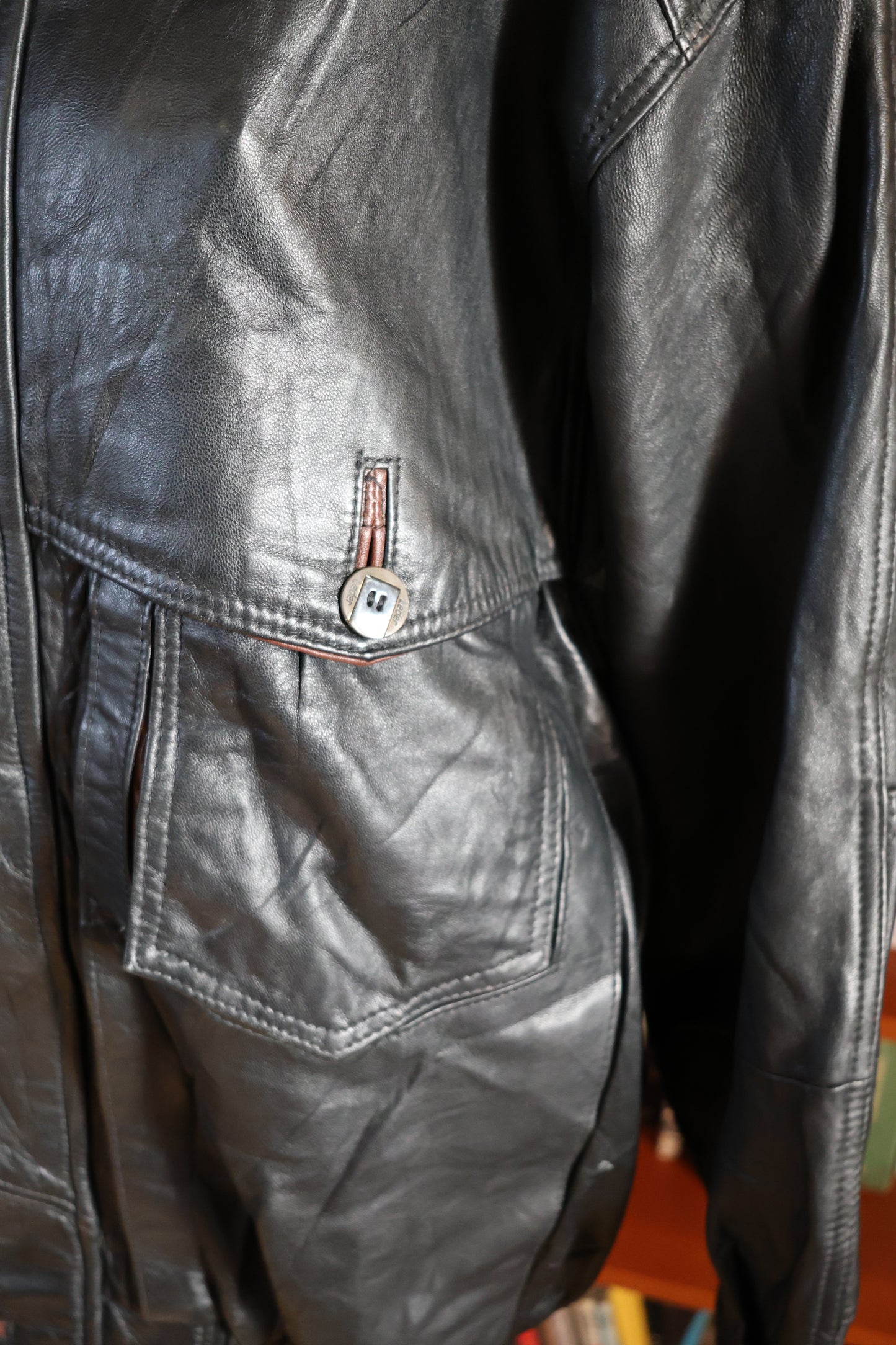 Black and brown leather bomber