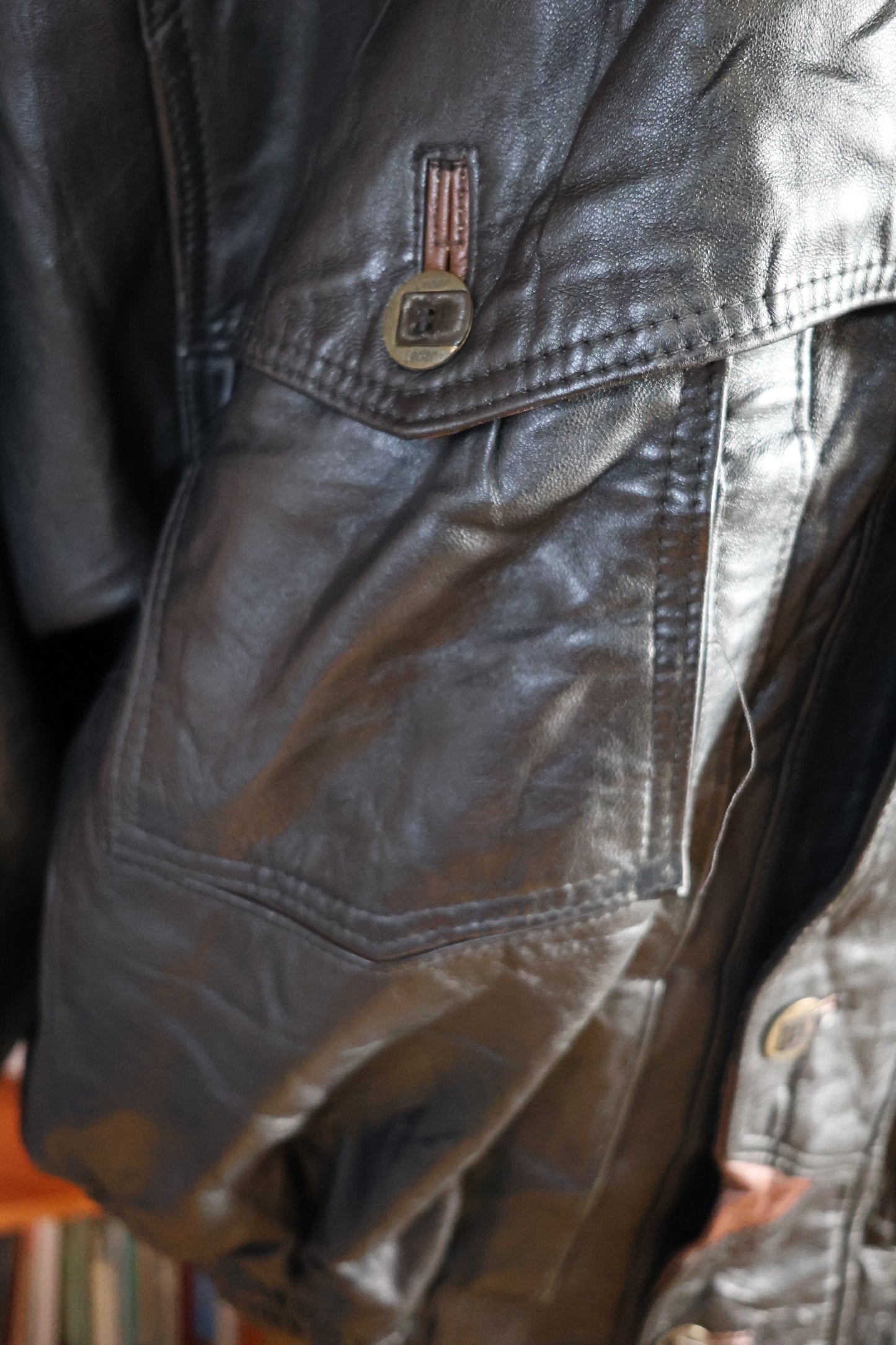 Black and brown leather bomber