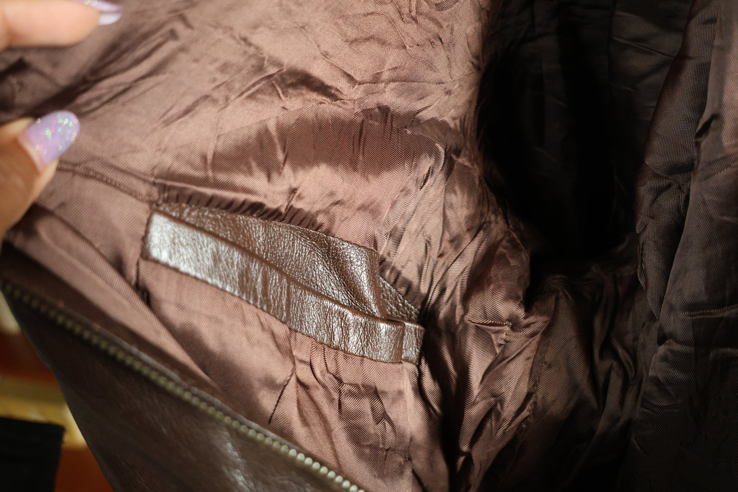Brown leather bomber